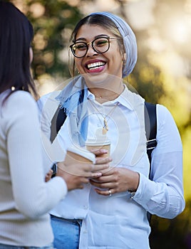 Laughing, break or university friends at park on campus for learning, education or goals together. Funny girls Muslim or