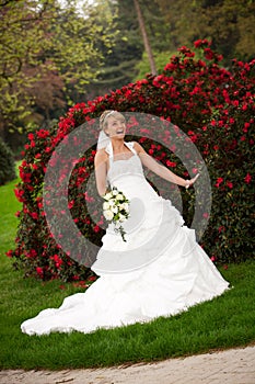 Laughing bride funny red roses