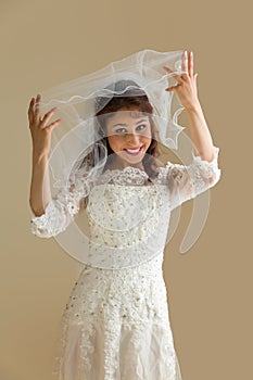 Laughing bride with veil