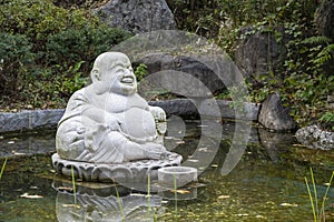Laughing Buddha, Budai or Fat Buddha at Bongeunsa Temple Seoul photo