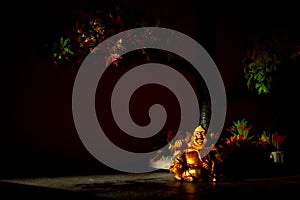 Laughing Buddha Statue on under the Tree. Statue of Laughing Buddha. Statue of kubera