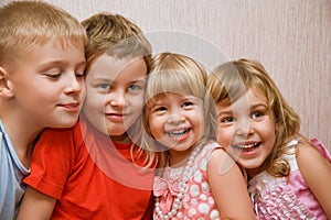 Laughing children in cosy room photo