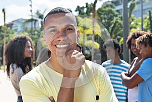 Laughing chilean guy with friends