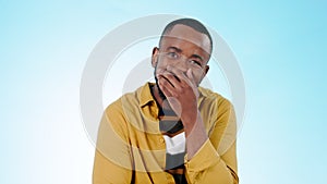 Laughing, cover mouth and face of black man on blue background for humor, funny joke and comic. Happy emoji, comedy and