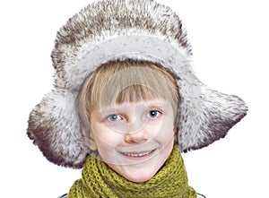 Laughing cute boy in winter cap