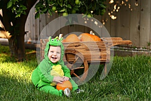 Laughing dragon baby in Halloween costume