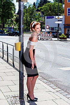 Laughing, elegant woman with red hair