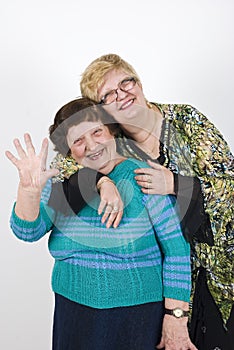 Laughing family waving