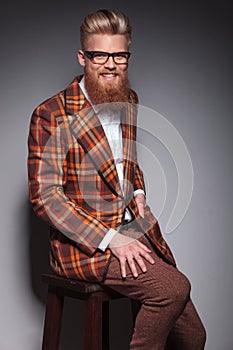 Laughing fashion man with long beard