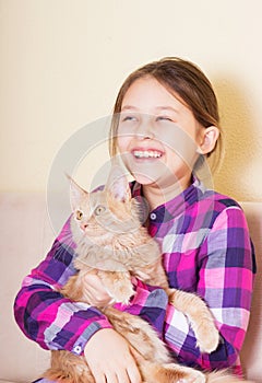 Laughing girl and cat