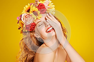 Laughing girl with floral wreath