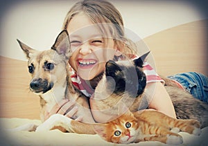 Laughing girl and pets