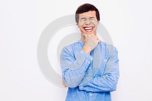 Laughing guy with hand on his chin
