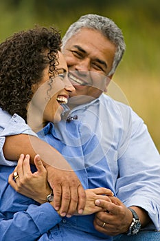 Laughing happy hispanic couple