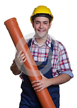 Laughing hispanic construction worker with water pipe