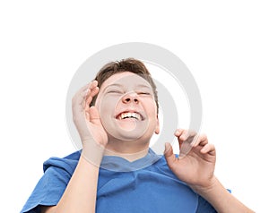 Laughing hysterically young boy isolated photo