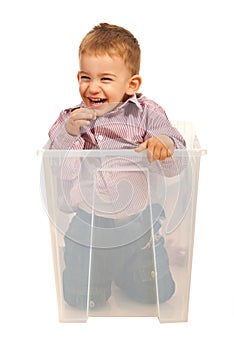 Laughing kid in a box