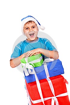 Laughing little boy in Santa's hat