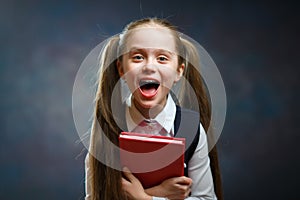 Laughing Long Hair Schoolgirl Hold Red Book Shout