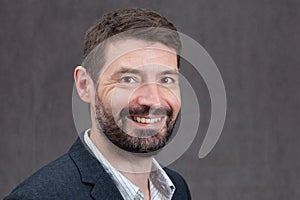 Laughing Man in Forties with a full beard