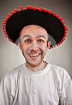 Laughing man in sombrero hat