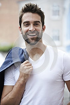 Laughing man in white t-shirt