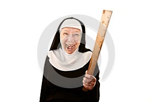 Laughing nun brandishing a ruler