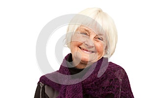 Laughing older woman on white background