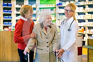 Laughing patients with happy doctor