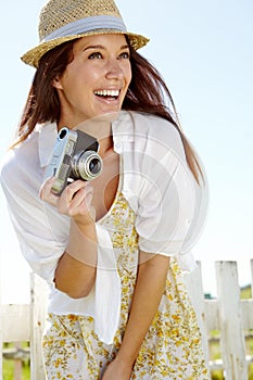 Laughing photographer, camera or travel blogger in holiday location, summer vacation or Germany sightseeing break. Smile