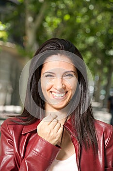Laughing pretty brunette woman