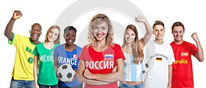 Laughing russian soccer supporter with fans from other countries