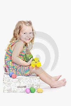 Laughing two years old girl in Eastertide