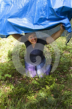 Laughing under a tarp