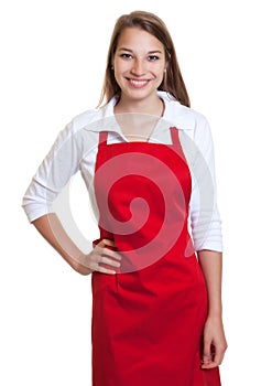 Laughing waitress with red apron