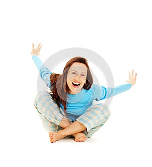 Laughing woman in blue pyjamas