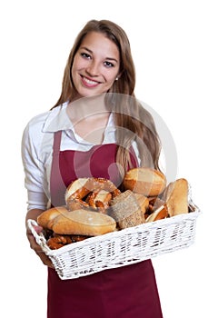 Laughing woman with bread rolls from the bakery