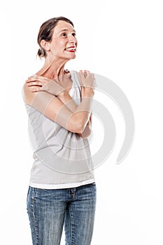 Laughing woman expressing delight wellbeing with body language