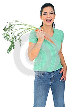 Laughing Woman Holding Carrot