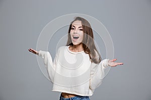 Laughing woman holding copyspace on the palms