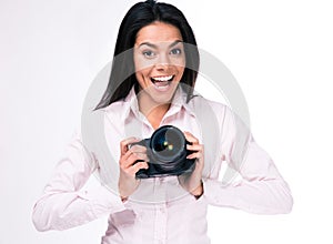 Laughing woman photographer with camera