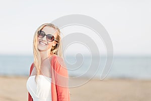 Laughing woman at the seaside