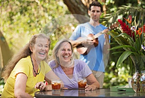 Laughing Women with Ukelele Player