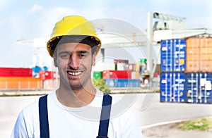 Laughing worker on a seaport