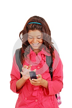 Laughing young girl with cell phone