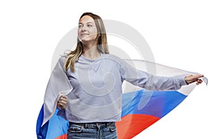 Laughing young girl with a russian flag. Celebrating Independence Day and patriotism. Isolated on a white background