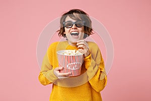 Laughing young woman girl in 3d imax glasses posing isolated on pink background. People sincere emotions in cinema