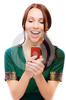 Laughing young woman reads sms