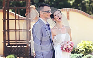 Laughter of a beautiful young bride on her wedding day