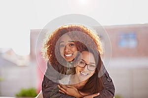 Laughter is always the best medicine. girlfriends bonding outdoors.